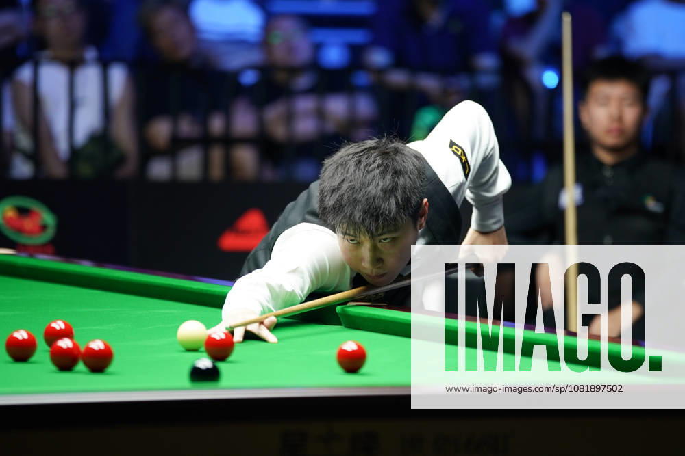 Zhao Xintong of China plays a shot in the second round match against Gao Yang of China on day 2 of Wuhan Open 2026 at the Optics Valley Gymnasium of Huazhong University of Science and Technology on August 24, 2026 in Wuhan, Hubei Province of China.