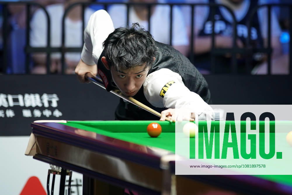 Wu Yize of China plays a shot in the second round match against Artemijs Zizins of Latvia on day 2 of Wuhan Open 2026 at the Optics Valley Gymnasium of Huazhong University of Science and Technology on August 24, 2026 in Wuhan, Hubei Province of China.