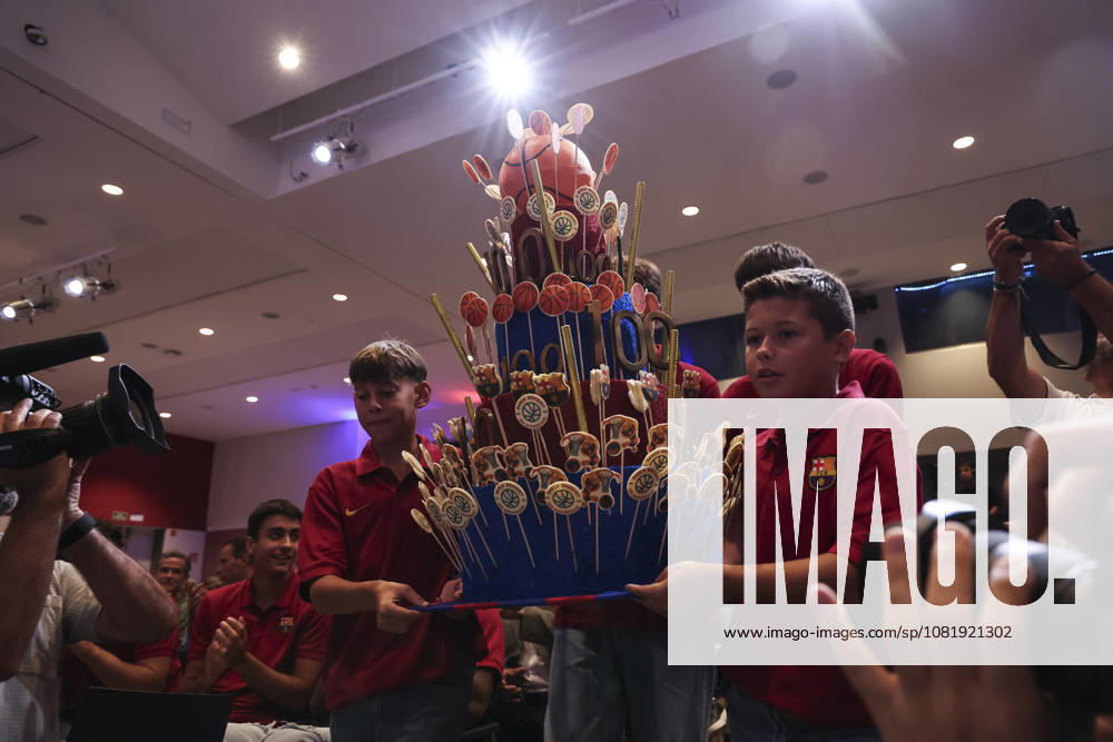 The celebratory cake is brought in during presentation of the Centenary events of the FC Barcelona, Barca Basketball section at Auditori 1899 on August 24, 2026 in Barcelona, Spain. Barcelona Spain - ZUMAa181 20260824_zaa_a181_044