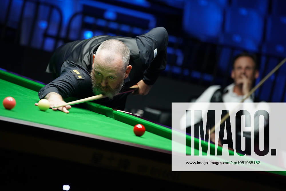 Mark Williams of Wales plays a shot during his round of 32 match against David Gilbert of England at the 2026 Wuhan Open on August 24, 2026 in Wuhan, Hubei Province of China. The tournament features top snooker players competing for the title.