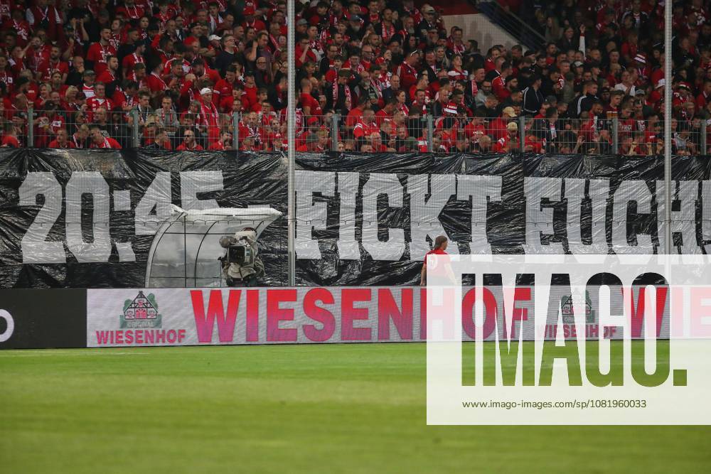 Halle an der Saale, Saxony-Anhalt, Germany, August 24, 2026, Leuna Chemie Stadium, DFB Cup, Hallescher FC vs. Schalke 04. Fans protest the kickoff time for the evening game at 8:45 p.m. Fuck you!
