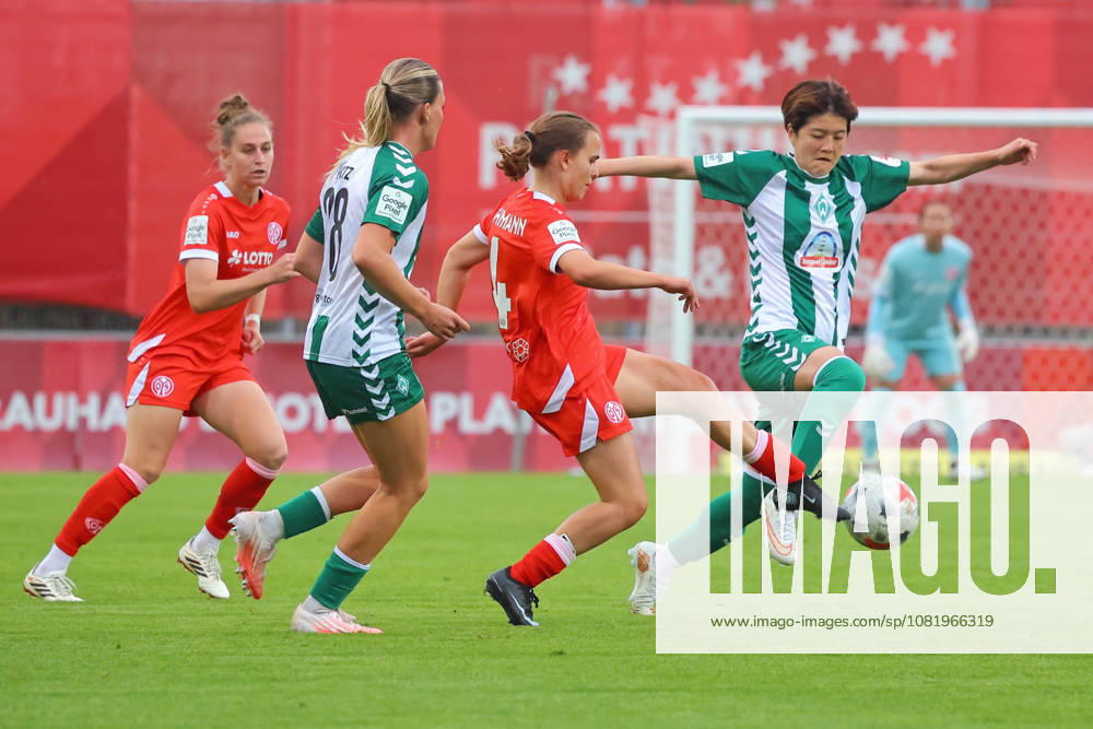 Mainz, Germany, August 24, 2026, 1st Bundesliga Women 2026–2027, Matchday 1, 1:0, FSV Mainz 05 vs. SV Werder Bremen. Pictured from left, battling for the ball: Saskia Matheis (FSV), Juliane Wirtz (SVW), Kara Bathmann (FSV), and Mei Shimada (SVW). DFL regulations prohibit any use of photographs as image sequences and or quasi-video. Bruchwegstadion, Rhineland-Palatinate
