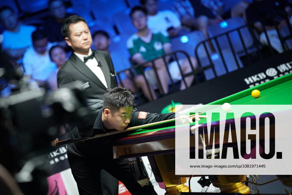 Pang Junxu of China plays a shot in the third round match against Shaun Murphy of England on day 3 of Wuhan Open 2026 at the Optics Valley Gymnasium of Huazhong University of Science and Technology on August 25, 2026 in Wuhan, Hubei Province of China.