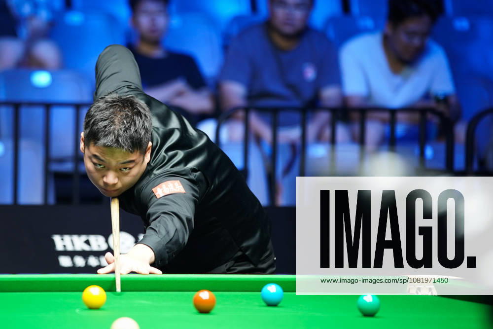 Pang Junxu of China plays a shot in the third round match against Shaun Murphy of England on day 3 of Wuhan Open 2026 at the Optics Valley Gymnasium of Huazhong University of Science and Technology on August 25, 2026 in Wuhan, Hubei Province of China.