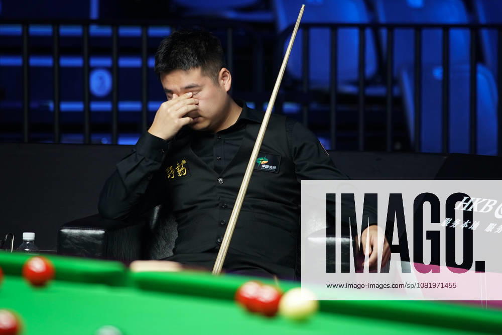 Pang Junxu of China reacts in the third round match against Shaun Murphy of England on day 3 of Wuhan Open 2026 at the Optics Valley Gymnasium of Huazhong University of Science and Technology on August 25, 2026 in Wuhan, Hubei Province of China.