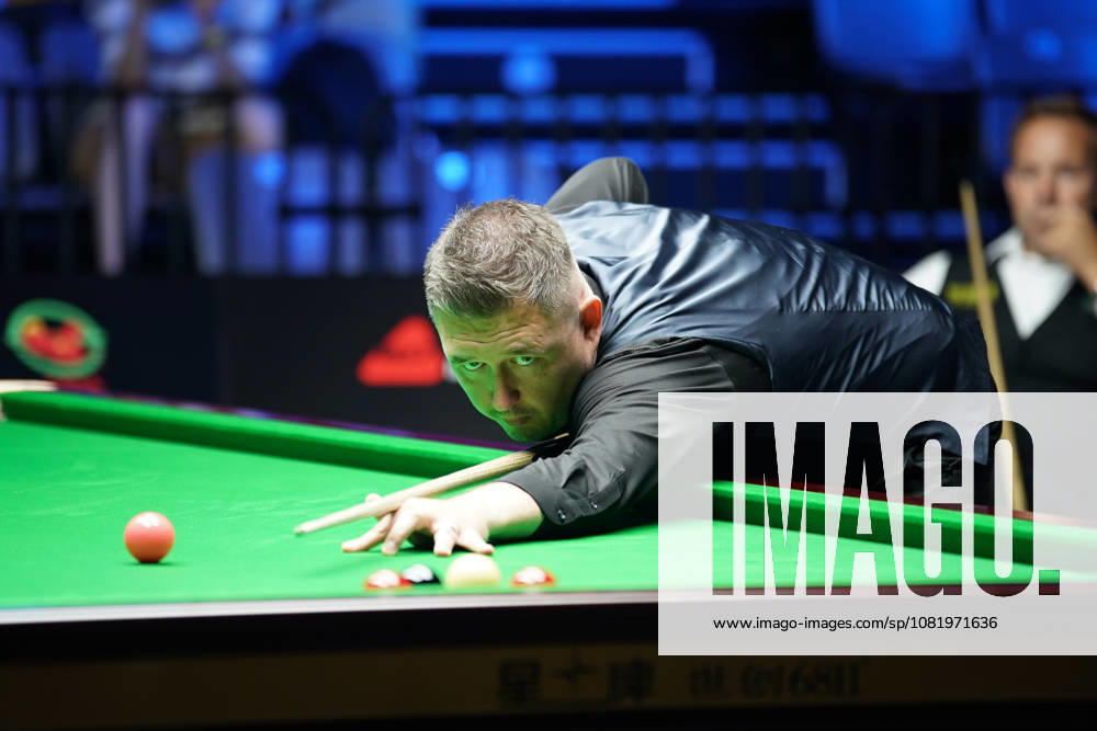 Kyren Wilson of England plays a shot in the third round match against Ali Carter of England on day 3 of Wuhan Open 2026 at the Optics Valley Gymnasium of Huazhong University of Science and Technology on August 25, 2026 in Wuhan, Hubei Province of China.