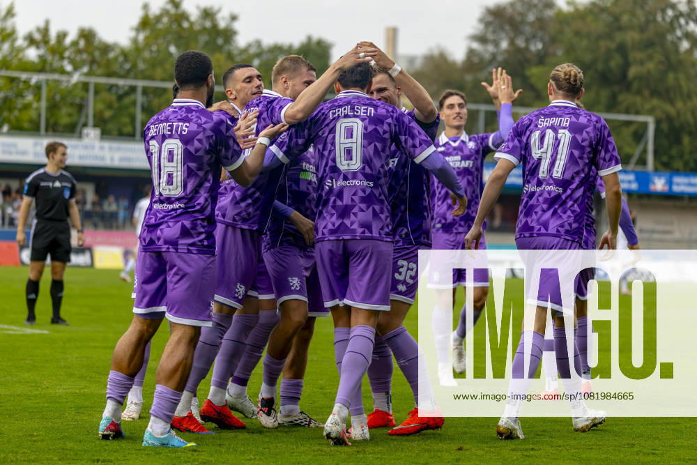 Burghausen, Germany, August 25, 2026—Toto Cup (Bavarian State Cup) 2026–2027, Round of 16: SV Wacker Burghausen vs. FC Ingolstadt 04. Pictured in the crowd, goal scorer Frederik Carlsen of FCI celebrates with his teammates; Flatbuy Stadium, Bavaria
