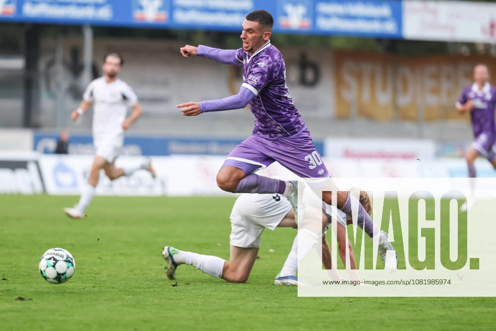 Toto Cup: SV Wacker Burghausen vs. FC Ingolstadt 04; Tackle; Battle for the Ball; Ognjen Drakulic 30, FCI Luca Paul Schulten 18 SVWB Toto Cup SV Wacker Burghausen FC Ingolstadt 04 2026–2027 season