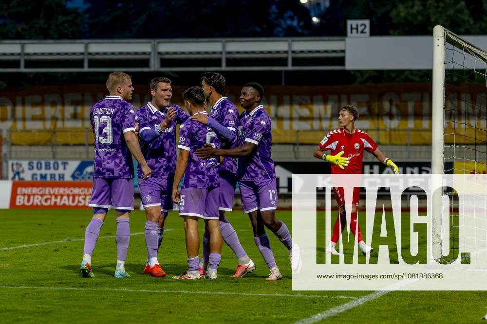 Burghausen, Germany, August 25, 2026, Toto Cup, 2026–2027 Bavarian State Cup, Round of 16: SV Wacker Burghausen vs. FC Ingolstadt 04. Pictured in the crowd: FCI goal scorer Emre Gül Guel celebrates his 0–2 goal with his teammates; Flatbuy Stadium, Bavaria