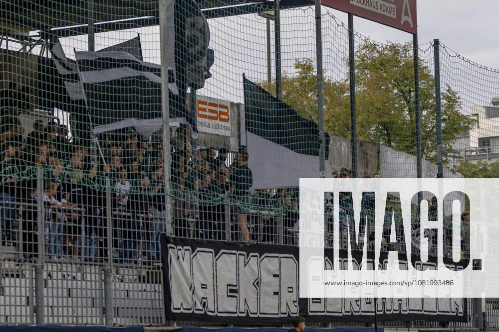 Toto Cup (Bavarian State Cup) 2026–2027 Round of 16: SV Wacker Burghausen vs. FC Ingolstadt 04. Pictured: Wacker Burghausen fans waving flags in the fan section at the flatbuy Stadium in Bavaria.