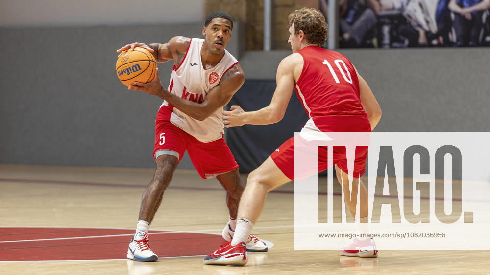 Pictured from left: Kenny Dye of the Würzburg Baskets, No. 5, with the ball against Calvin Wishart of the Würzburg Baskets, No. 10, on August 27, 2026, during media training for the Fitness First Würzburg Baskets 2026–27, Germany, Würzburg, Training Center,