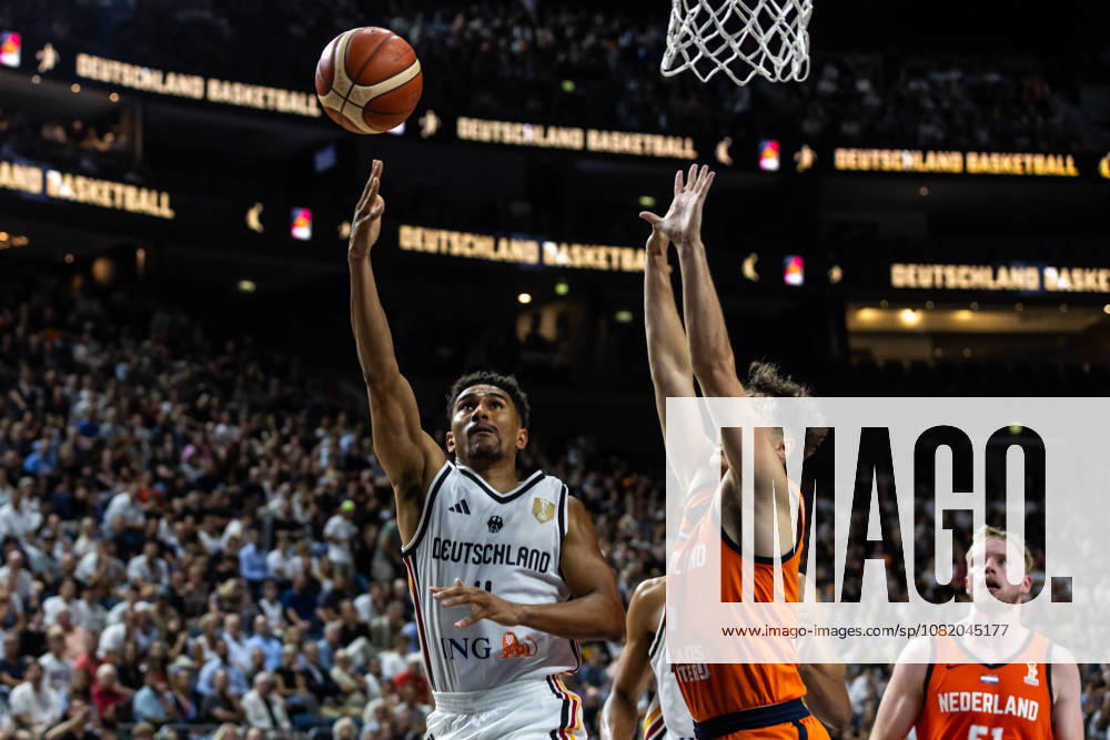 GER, FIBA 2027 Basketball World Cup, European Qualifiers Cologne, Germany vs. Turkey; Maodo Lo (Germany), No. 4, in a one-on-one matchup against Sander Hollanders (Netherlands), No. 6; Cologne, LANXESS arena, North Rhine-Westphalia, Germany