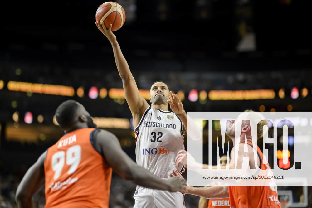 Johannes Thiemann, Germany in Action, shot, by Nathan Kuta, Netherlands Men s Basketball FIBA World Cup Qualifier, Second Round, Group K, Germany vs. Netherlands, on August 27, 2026, at the LanxessArena in Cologne, Germany