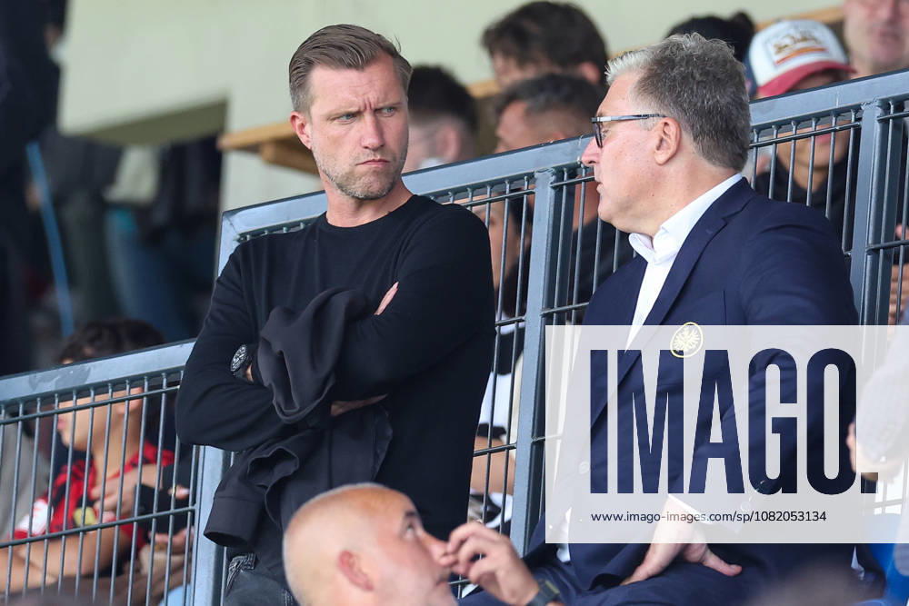 Soccer: DFB Cup – SC St. Tönis vs. Eintracht Frankfurt on August 21, 2026, at Grotenburg Stadium in Krefeld; Sports Director Markus Krösche (Kroesche, Krosche) of Frankfurt in discussion with Axel Hellmann of Frankfurt MH