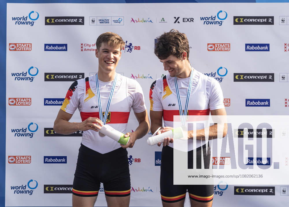 Amsterdam The Netherlands 27th August 2026 2026 World Rowing Championships on the Bosbaan in Amsterdam Lightweight Men s Double Sculls Final A (Final) Medal ceremony Naveen Alexander Shah and Maximilian Ruehling (GER) win silver. Checking out their Amsterdammetje shaped water bottles. watersport,