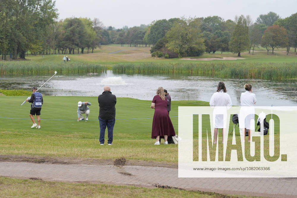 SUTTON COLDFIELD, ENGLAND - AUG 28: Spectators in their dressing gowns watch the early play during the completion of the delayed Round 1 at the 2026 Husqvarna British Masters at The Belfry, Sutton Coalfield on August 28, 2026 in Warwickshire, England The 2026 Husqvarna British Masters