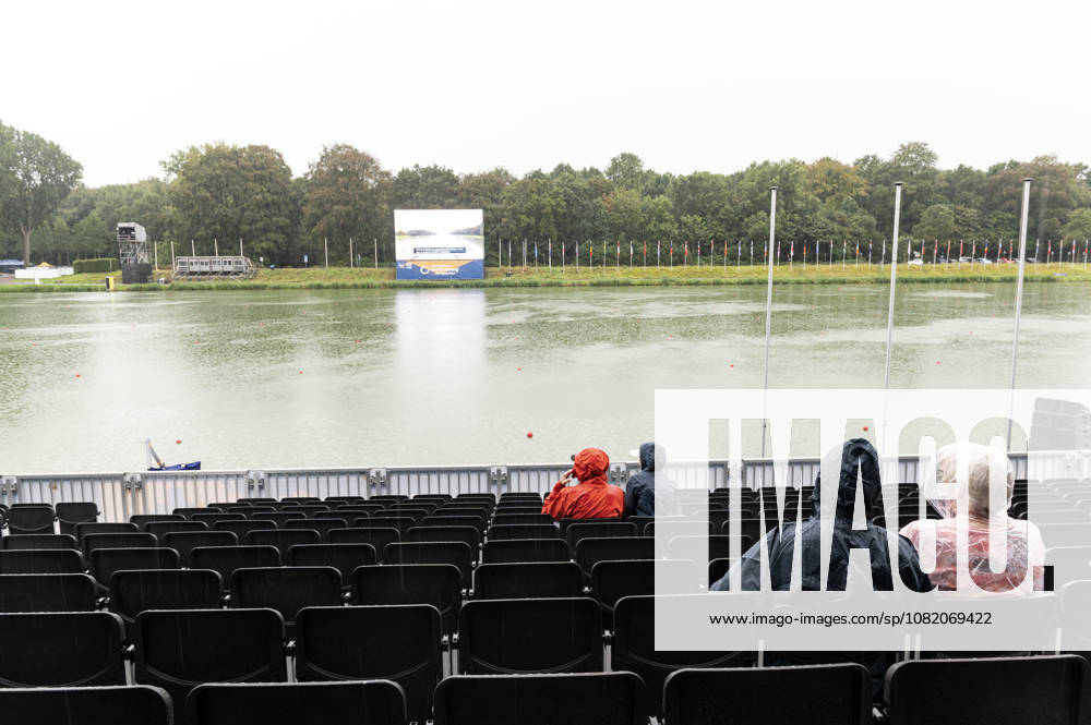 Amsterdam The Netherlands 28th August 2026 2026 World Rowing Championships on the Bosbaan in Amsterdam Rain stops play. Bad weather doesnt exist if you have the correct clothing. A few brave souls wait in the rain on the tribune for the racing to recommence.