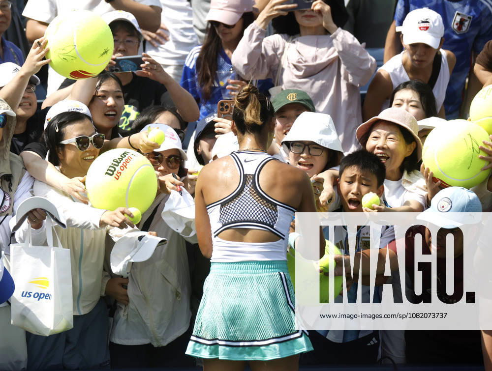 Qinwen Zheng of China signs autographs after match point defeating Elena Pridankina in straight sets in their qualifying final at the 2026 US Open Tennis Championship at the USTA Billie Jean King National Tennis Center in New York City on Friday, August 28, 2026. NYP20260828127 JOHNxANGELILLO
