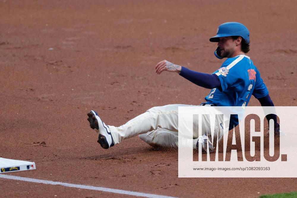 Milwaukee Brewers second baseman BRICE TURANG (2) slides into third base in a baseball game, Friday, Aug. 28, 2026, in Milwaukee, Wisconsin. MLB, Baseball Herren, USA 2026 - Rangers 1:6 Brewers - ZUMAa325 20260828_zsa_a325_024