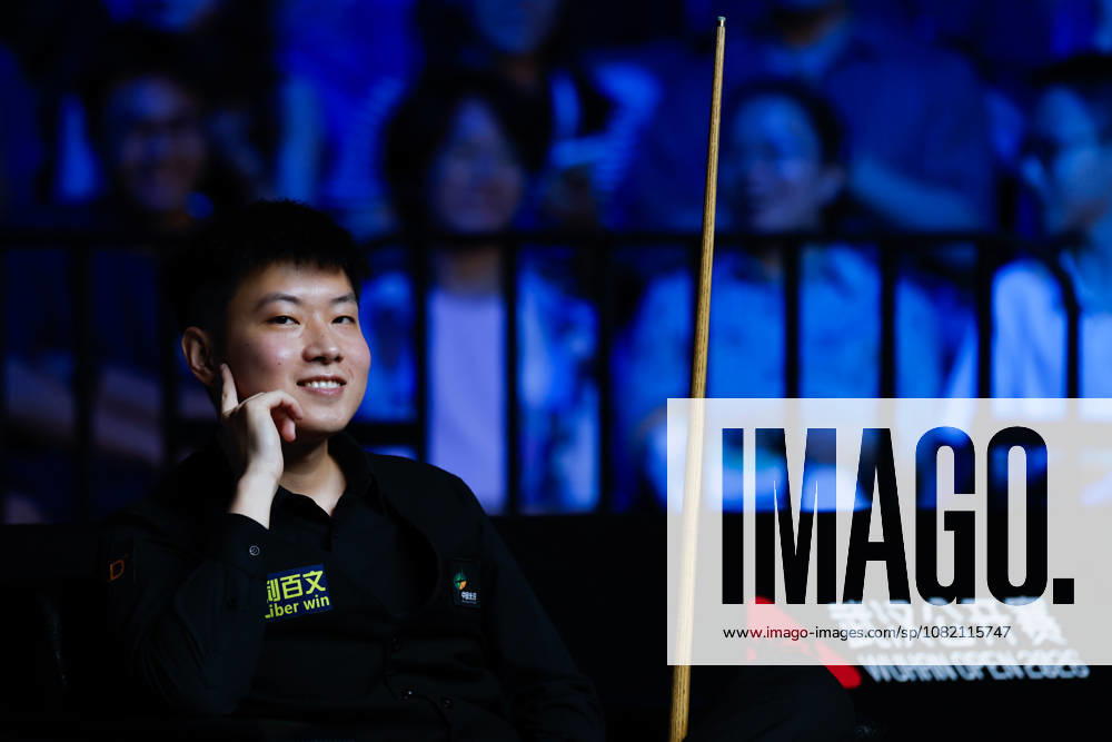 (260829) -- WUHAN, Aug. 29, 2026 -- Zhao Xintong reacts during the final match between Zhao Xintong of China and Chang Bingyu of China at Wuhan Open 2026 snooker tournament in Wuhan, central China s Hubei Province, Aug. 29, 2026. ) (SP)CHINA-SNOOKER-WUHAN OPEN (CN) WuxZhizun