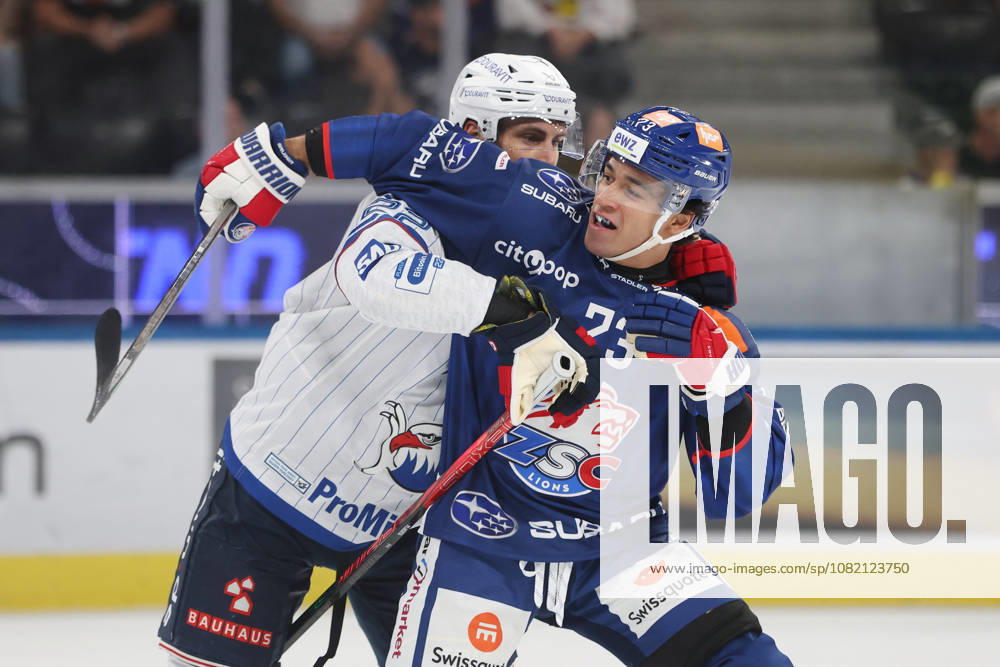 Zurich, SWITZERLAND, Swiss Life Arena, 2026–2027 Ice Hockey Season, Exhibition Game: ZSC Lions vs. Adler Mannheim, Matthias Plachta (Adler) battles Kimo Gruber (ZSC)