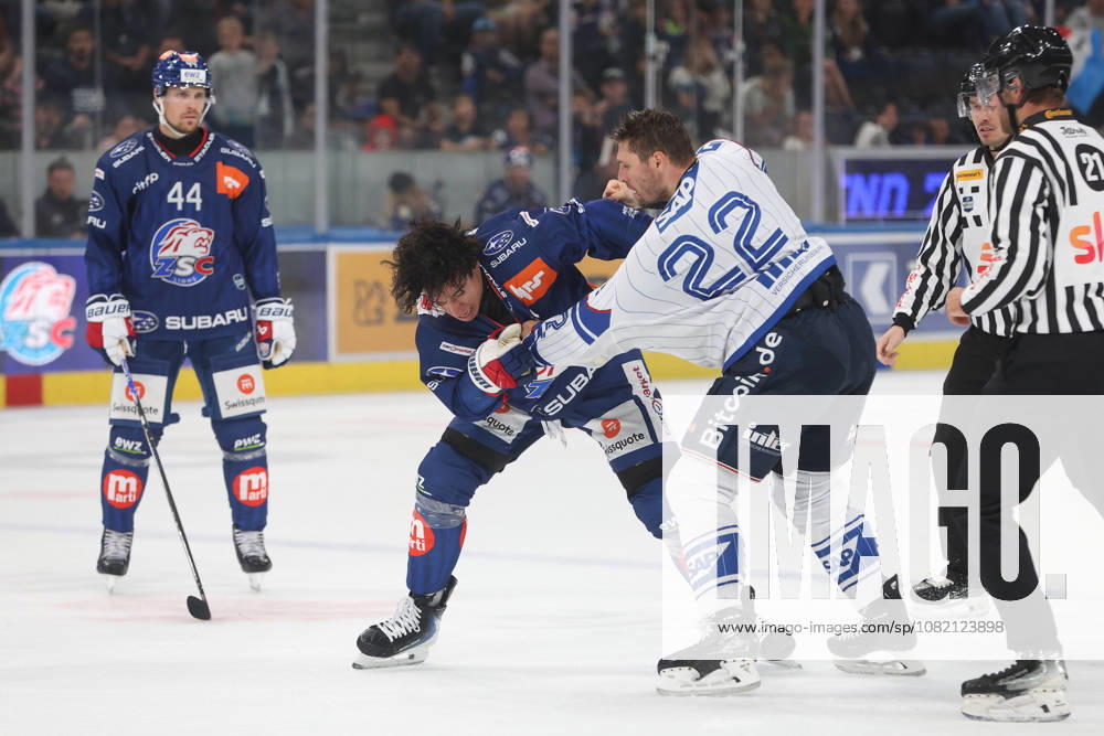 Zurich, SWITZERLAND, Swiss Life Arena, 2026–2027 Ice Hockey Season, Exhibition Game: ZSC Lions vs. Adler Mannheim, Matthias Plachta (Adler) battles Kimo Gruber (ZSC)
