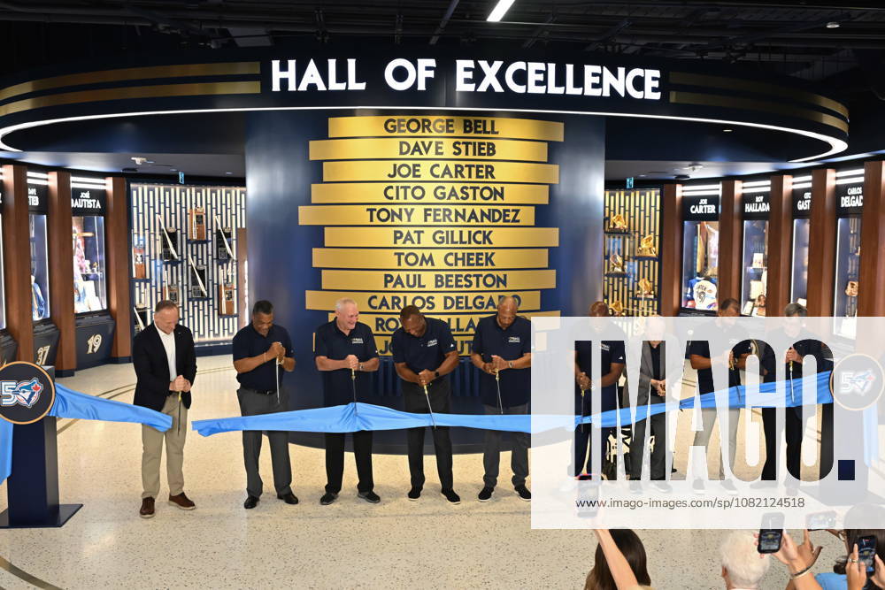 Former and current Toronto Blue Jays players and management, from left, Mark Shapiro, George Bell, Dave Stieb, Joe Carter, Cito Gaston, Carlos Delgado, Jose Bautista, Paul Beeston and Pat Gillick open the team s new Hall of Excellence at Rogers Centre in Toronto on Saturday, Aug. 29, 2026. Canada News - August 29, 2026 - ZUMAc35_ 20260829_zaf_c35_020