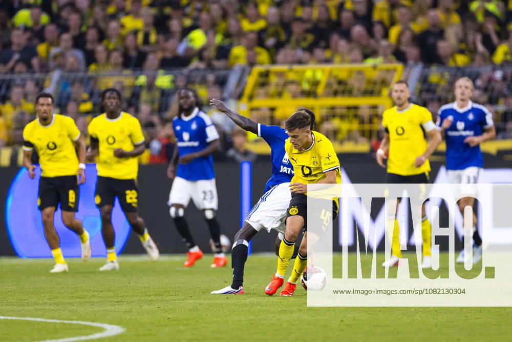 Soccer, Matchday 1 of the 1st Bundesliga, Borussia Dortmund vs. Hamburger SV; Giannis Konstantelias of Borussia Dortmund is injured in a tackle with Bakery Jatta of Hamburger SV; Dortmund, Signal Iduna Park, North Rhine-Westphalia, Germany; xRHR PHOTO DEx
