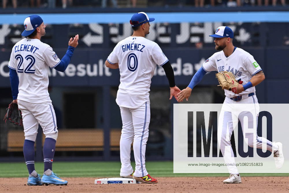 Toronto Blue Jays, from left, Ernie Cement, Andres Gimenez and Nathan Lukes celebrate after their team defeated the Seattle Mariners in MLB, Baseball Herren, USA baseball action in Toronto on Saturday, Aug. 29, 2026. Canada News - August 29, 2026 - ZUMAc35_ 20260829_zaf_c35_142
