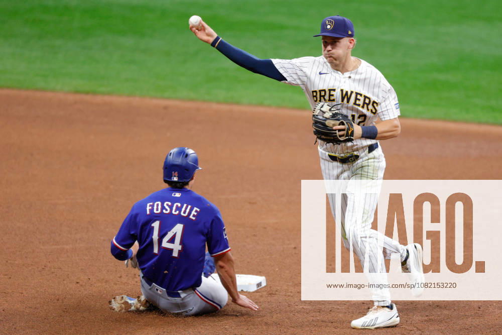 Milwaukee Brewers shortstop COOPER PRATT (12) throws to first to complete a double play on a hit by Texas Rangers shortstop COREY SEAGER (5) in a baseball game, Saturday, Aug. 28, 2026, in Milwaukee, Wisconsin. MLB, Baseball Herren, USA 2026 - Rangers 3: 5 Brewers - ZUMAa325 20260829_zsa_a325_025
