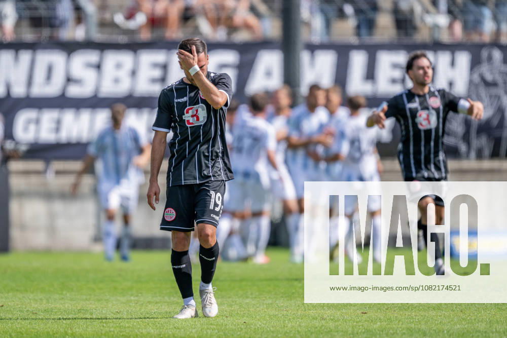 Furkan Kircicek of TSV 1882 Landsberg, 19, is fed up, while in the background the Lions celebrate their 1-0 goal. GER, TSV 1860 Munich vs. TSV Landsberg 1882, Soccer, Bavarian Regional League, Matchday 6, 2026–2027 season, August 30, 2026. DFL and DFB regulations prohibit any use of photographs as image sequences and or quasi-video. Photo: HMB Media, Heike Feiner