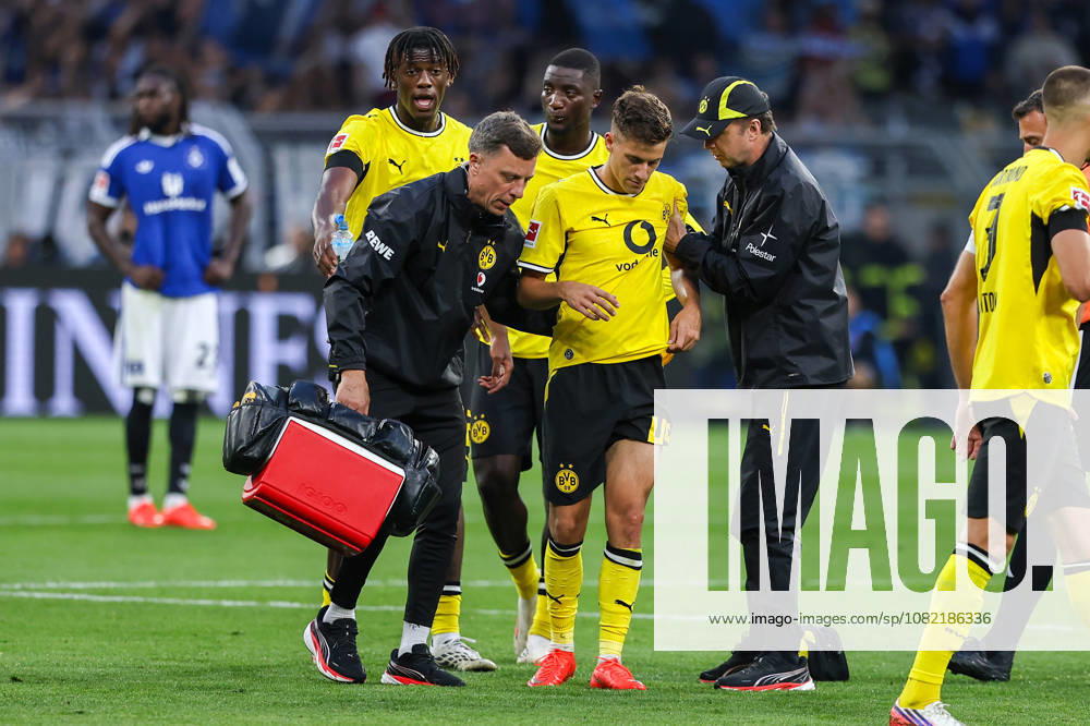 Soccer, Bundesliga, Borussia Dortmund vs. Hamburger SV, Signal Iduna Park, Matchday 1, 2026–2027 Season: Giannis Konstantelias of Borussia Dortmund (No. 45) is injured and carried off the field. DFB regulations prohibit any use of photographs as image sequences and or quasi-video. Photo: WilkowskixPressefotoKochx, North Rhine-Westphalia, Germany