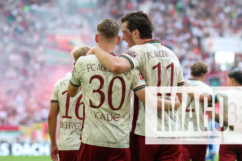 Goal celebration by Anton Kade (30, FC Augsburg) and Michael Gregoritsch (11, FC Augsburg) for the 1-0 lead, FC Augsburg vs. FC Schalke 04, Soccer, Bundesliga 1, Matchday 1, August 30, 2026. DFB regulations prohibit any use of photographs as image sequences and or quasi-video. Augsburg, Bavaria, Germany