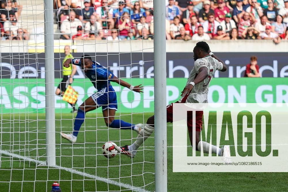 Chrislain Matsima (5, FC Augsburg) makes a save on the goal line against Moussa Sylla (9, FC Schalke 04), FC Augsburg vs. FC Schalke 04, Soccer, Men, Bundesliga, 2026–2027 Season, First Half of the Season, Matchday 1, August 30, 2026. DFB regulations prohibit any use of photographs as image sequences and or quasi-video. Augsburg, Bavaria, Germany