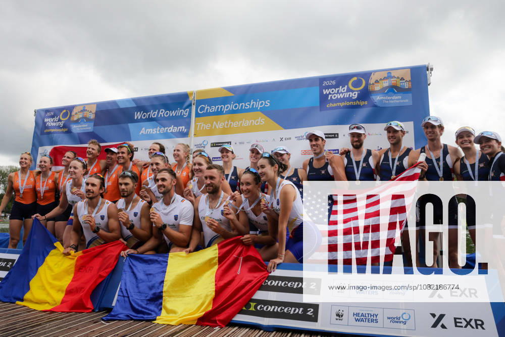 30th August 2026; Bosbaan, Amsterdam, Holland, Netherlands; 2026 World Rowing Championships, Final Day; the medal ceremony; Netherlands Mixed Eight (Mix8+) with Linn van Aanholt, Nika Johanna Vos, Ymkje Clevering, Gert-Jan van Doorn, Lennart van Lierop, Eli Brouwer, Rik Rienks and Tinka Offereins, coxed by Richelle Rietdijk silver medallists, Romania Mixed Eight (Mix8+) with Cristina Druga, Amalia Chelaru, Adriana Adam, Florin Sorin Lehaci, Cosmin Iulian Plesescu, Ciprian Tudosa, Stefan Constanti Berariu and Simona Radis, coxed by Victoria Stefani Petreanu gold medallists and United States Mixed Eight (Mix8+) with Molly Bruggeman, Azja Czajkowski, Teal Cohen, Gus Rodriguez, Peter Chatain, Chris Carlson, Pieter Quinton and Kate Knifton, coxed by Rachel Rane bronze medallists AnthonyxBenoit