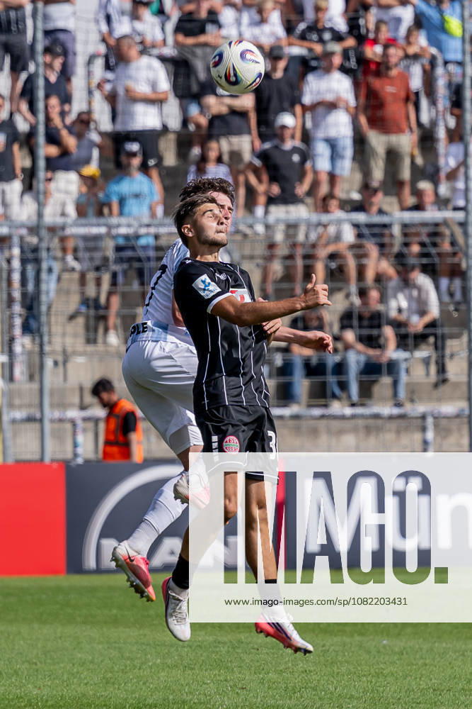Heading duel between Lance Fiedler of TSV 1860 Munich, 47, and Tiziano Mulas of TSV 1882 Landsberg, 30 (GER), TSV 1860 Munich vs. TSV Landsberg 1882, soccer, Bavarian Regional League, Matchday 6, 2026–2027 season, August 30, 2026 Photo: HMB Media, Heike Feiner