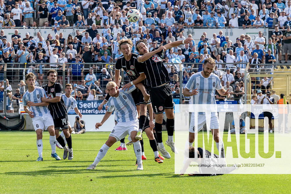 Fynn Heinze (TSV 1882 Landsberg), 13, and David Bauer (TSV 1882 Landsberg), 29, vs. Lasse Fassmann (TSV 1860 Munich), 33, and Michael Eberwein (TSV 1860 Munich), 13, GER, TSV 1860 Munich vs. TSV Landsberg 1882, Soccer, Bavarian Regional League, Matchday 6, 2026–2027 Season, August 30, 2026 DFL and DFB regulations prohibit any use of photographs as image sequences and or quasi-video. Photo: HMB Media, Heike Feiner