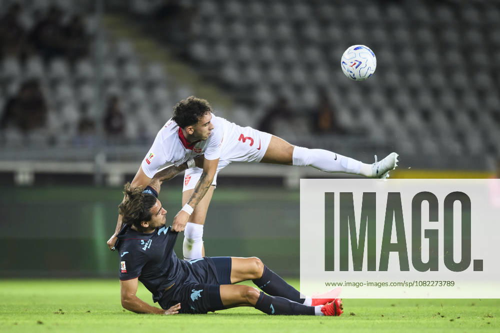 Torino FC v AC Monza - Coppa Italia Lorenzo Lucchesi of AC Monza competes for the ball with Sandro Kulenovic of Torino FC during the Coppa Italia football match between Torino FC and AC Monza. Turin Italy