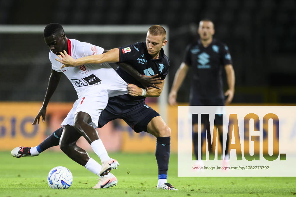 Torino FC v AC Monza - Coppa Italia Omari Forson of AC Monza competes for the ball with Pietro Comuzzo of Torino FC during the Coppa Italia football match between Torino FC and AC Monza. Turin Italy