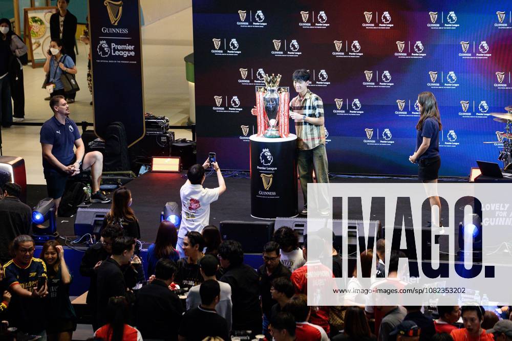 Football Fans Attend Premier League Trophy Tour in Bangkok BANGKOK, THAILAND SEPTEMBER 4, 2026: Football fans gather during the Premier League Trophy Tour in Bangkok, Thailand. The event offers supporters an opportunity to view the Premier League trophy on display. Bangkok Thailand