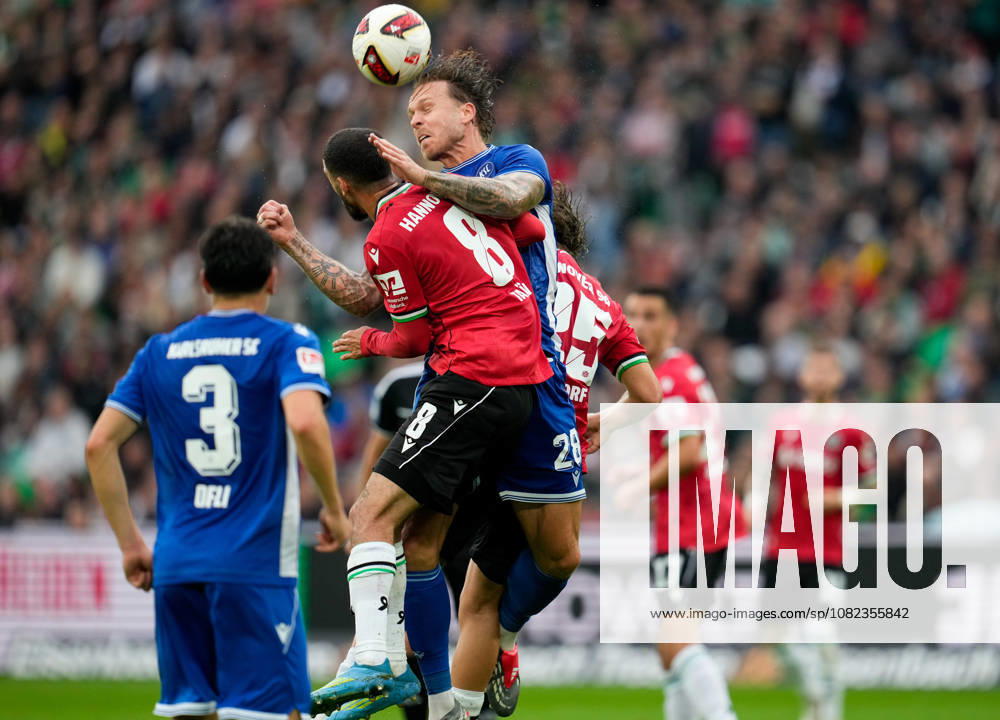 Waniss Taibi (Hannover 96), 8, and Marcel Franke (Karlsruher SC), 28, jump for a header, GER, Hannover 96 vs. Karlsruher SC, 2. Bundesliga, Matchday 4, 2026–27 season, Heinz von Heiden Arena, Hannover, September 4, 2026 DFL regulations prohibit any use of photographs as image sequences and or quasi-video GER, Hannover 96 vs. Karlsruher SC, 2. Bundesliga, Matchday 4, 2026–27 season, September 4, 2026, Hannover