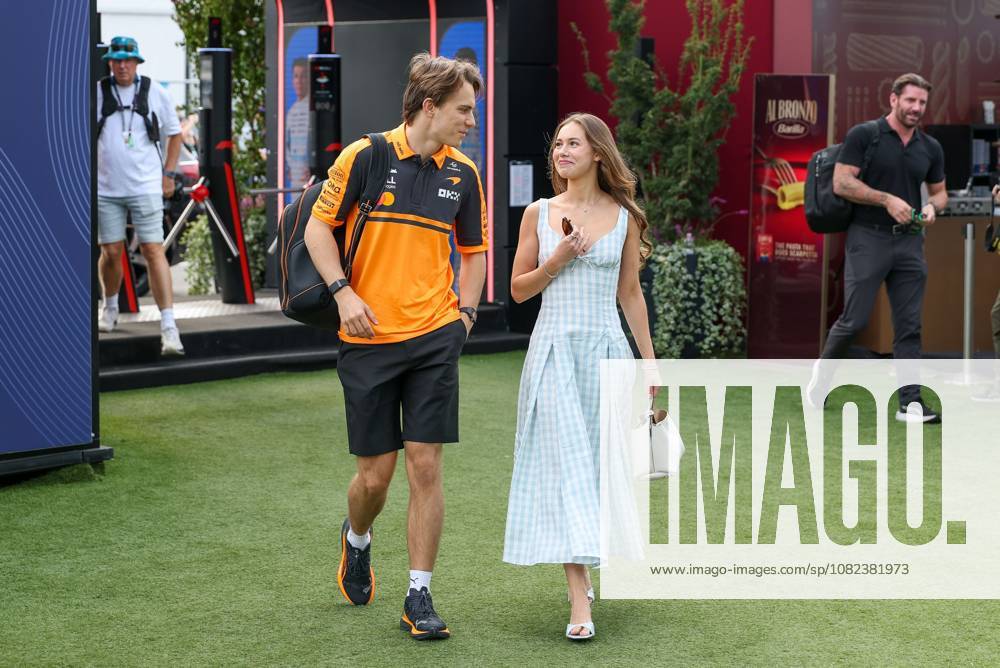 Oscar Piastri of the McLaren Formula 1 Team No. 81 and his partner, Lily Zneimer, arrive at the paddock; Free Practice 3, Italian Grand Prix, Motorsports, Men, Formula 1, September 5, 2026, Monza, Lombardy, Italy