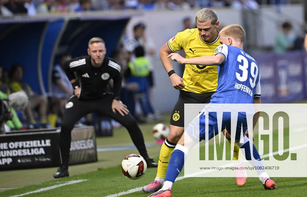 Tackle, Mats Rots of TSG 1899 Hoffenheim (39) challenges Julian Ryerson of Borussia Dortmund (BVB) (26). Fourth official: Referee Lars Erbst. TSG 1899 Hoffenheim vs. Borussia Dortmund (BVB), September 5, 2026. DFL REGULATIONS PROHIBIT ANY USE OF PHOTOGRAPHS AS IMAGE SEQUENCES AND OR QUASI-VIDEO TSG 1899 Hoffenheim vs. Borussia Dortmund BVB