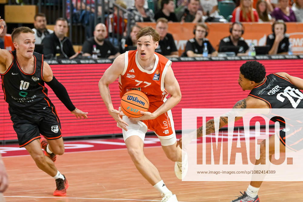 Timo Lanmueller (RASTA Vechta), 77, with the ball against Oscar Jorgensen (Bakken Bears), 10, and Miles Corey (Bakken Bears), 20; RASTA Vechta vs. Bakken Bears, exhibition game, 2026–2027 season, September 5, 2026, RASTA Vechta vs. Bakken Bears, exhibition game, 2026–2027 season, September 5, 2026, Vechta