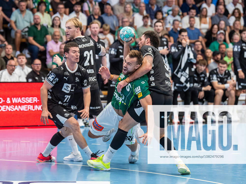 Ludvig Jurmala Astroem of Frisch Auf Goeppingen, No. 25, in a duel with Veron Nacinovic of THW Kiel, No. 93, Frisch Auf Goeppingen vs. THW Kiel, Handball, 1st Bundesliga, Men s, 2026–2027 Season, September 6, 2026, Frisch Auf Goeppingen vs. THW Kiel, Handball, 1st Bundesliga, Men, 2026–2027 season, September 6, 2026, Goeppingen