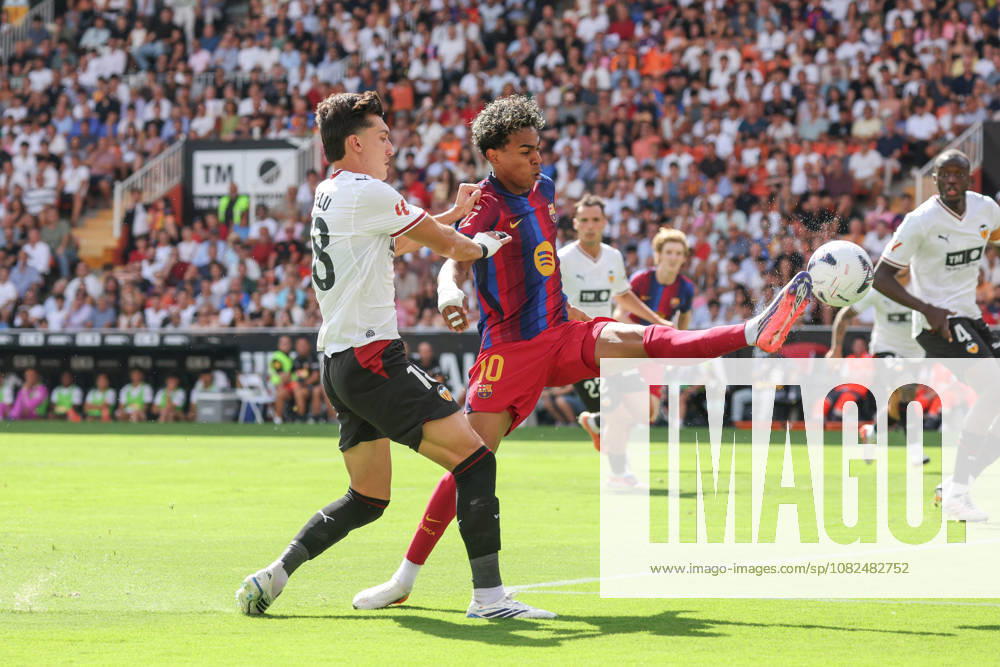 Spain - LaLiga EA - Valencia CF vs FC Barcelona, Barca - 06 09 2026 SPAIN, VALENCIA, SEPTEMBER 06. Lamine Yamal of FC Barcelona scores his team s opening goal under pressure from Pepelu of Valencia during the LaLiga EA Sports football match between Valencia CF and FC Barcelona on September 06, 2026 at Estadio Mestalla in Valencia, Spain. Photo by Manuel Blondeau AOP.Press Valencia Estadio Mestalla Valencian Community Spain