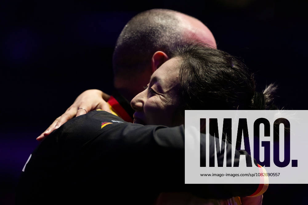 (260909) -- MACAO, Sept. 9, 2026 -- Han Ying (R) hugs her coach after the women s singles round of 32 match between Kuai Man of China and Han Ying of Germany at the 2026 World Table tennis, Tischtennis (WTT) Champions Macao in Macao, south China, Sept. 9, 2026. ) (SP)CHINA-MACAO-TABLE TENNIS-WTT-WOMEN S SINGLES (CN) CheongxKamxKa