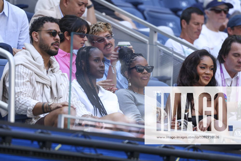 US Open tennis tournament - Day 11 American actor Sarunas J. Jackson (L), American actor and writer Issa Rae (2L), and American rapper Saweetie (R) attend a Women s Singles Quarterfinals match of the US Open Tennis Championships in Flushing Meadows, New York, USA, 09 September 2026. FLUSHING MEADOWS NEW YORK United States