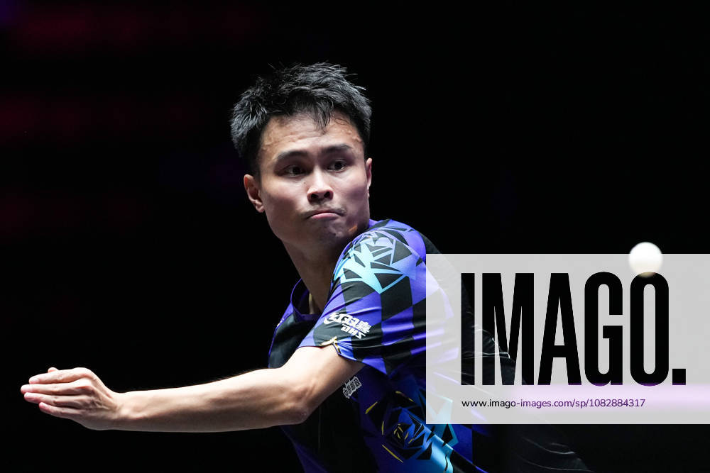 (260911) -- MACAO, Sept. 11, 2026 -- Zhou Qihao hits a return during the men s singles round of 16 match between Zhou Qihao of China and Kanak Jha of the United States at the 2026 World Table tennis, Tischtennis (WTT) Champions Macao in Macao, south China, Sept. 11, 2026. ) (SP)CHINA-MACAO-TABLE TENNIS-WTT-MEN S SINGLES (CN) CheongxKamxKa