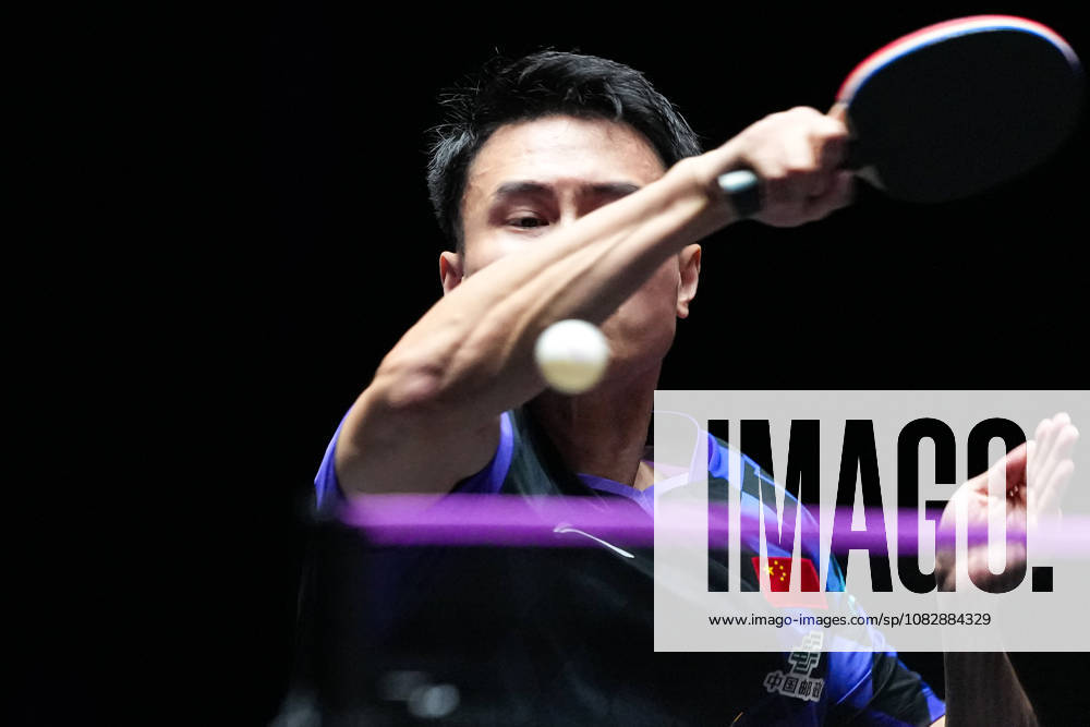 (260911) -- MACAO, Sept. 11, 2026 -- Zhou Qihao hits a return during the men s singles round of 16 match between Zhou Qihao of China and Kanak Jha of the United States at the 2026 World Table tennis, Tischtennis (WTT) Champions Macao in Macao, south China, Sept. 11, 2026. ) (SP)CHINA-MACAO-TABLE TENNIS-WTT-MEN S SINGLES (CN) CheongxKamxKa